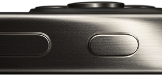 Side view of iPhone 15 Pro in a titanium design showing a volume button-a and Action button-a