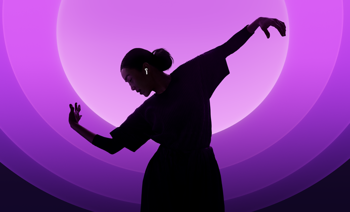 A person dancing while wearing AirPods 5, multicolour background