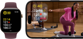 Apple Watch next to iPhone with Apple Fitness+ class on screen