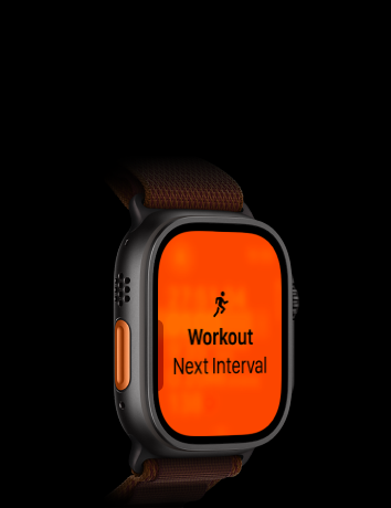 Apple Watch Ultra 4, titanium case, black colour, Running workout, next interval, left side exterior, orange Action button, Alpine Loop strap