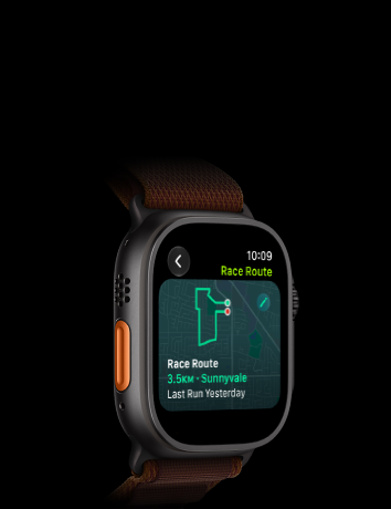 Apple Watch Ultra 4, titanium case, black colour, Race Route feature with a map of a running route, left side exterior, Action button, Alpine Loop strap, burgundy colour