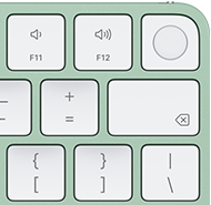 Magic Keyboard, top-right corner, green colour, Touch ID , delete key and volume function keys