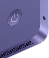iMac, rear exterior, purple colour, features: power button, headphone jack and speaker grille