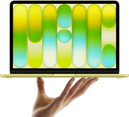 MacBook Neo in citrus colour, balanced on fingertips of open hand, screen displaying colourful abstract pattern
