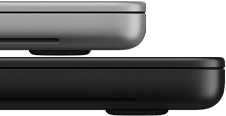 14-inch MacBook Pro with PROLED XDR Display, silver colour, stacked on top of 16-inch model, space black colour, showing size difference
