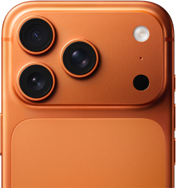 An image showing the back top half of the iPhone 17 Pro in Cosmic Orange, focusing on the three cameras and flash