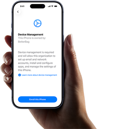 Right hand holding iPhone with screen displaying copy explaining what Device Management is with option to enrol