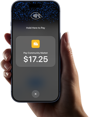 Right hand holding iPhone with display showing specific amount to be paid and instructions on how to contactlessly pay when ready