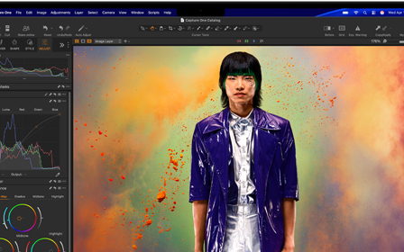 MacBook Pro screen showing a photo of a person being edited in Capture One