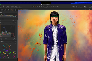 MacBook Pro screen showing a photo of a person being edited in Capture One