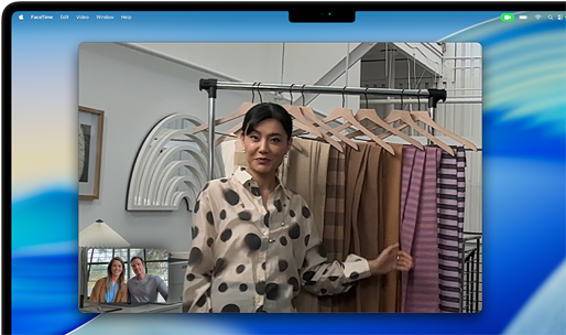 A video call on MacBook Pro, a woman talks to two people on the call, Centre Stage keeps her centred in the frame