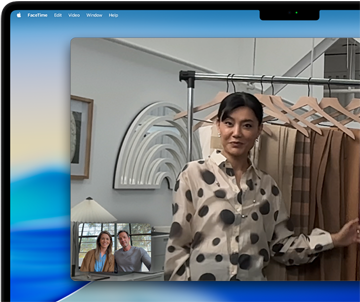 A video call on MacBook Pro, a woman talks to two people on the call, Centre Stage keeps her centred in the frame
